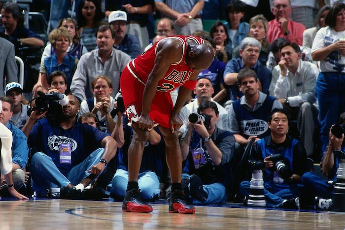 Michael Jordan wearing the Air Jordan 12 Flu Game
